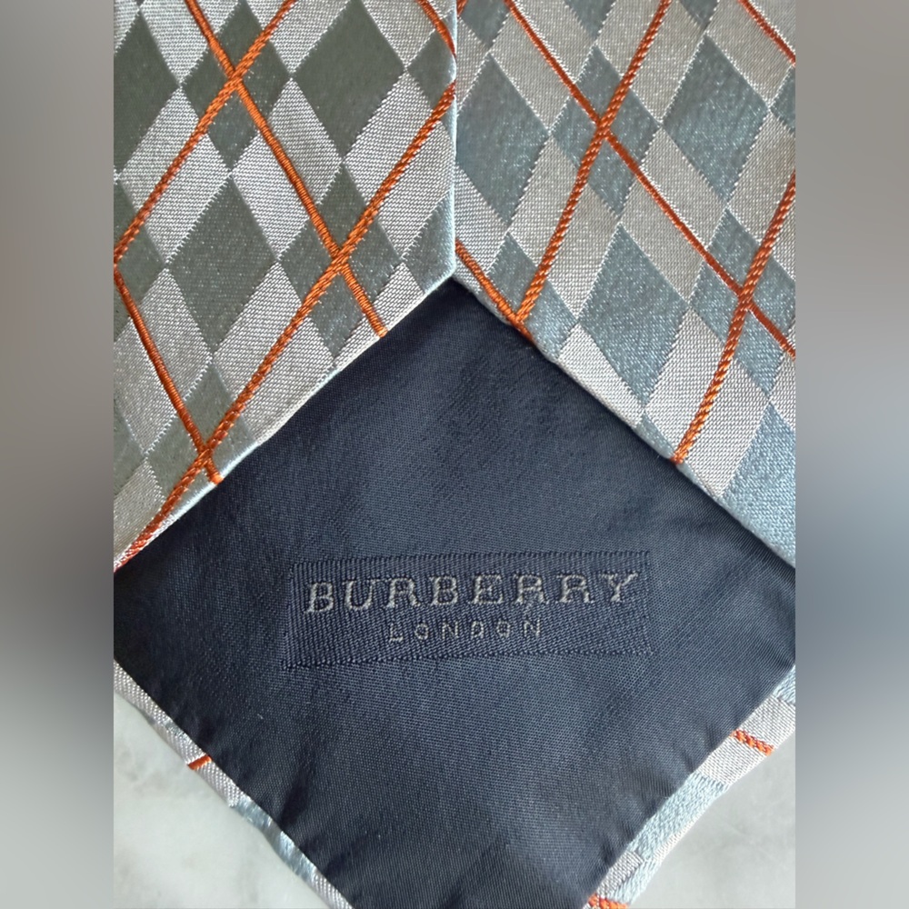 Authentic Burberry Men’s 100% Silk Argyle Tie in Blue Gray with Orange Stitching